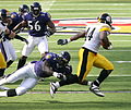 Najeh Davenport tries to escape from the Ravens defense, 2006.