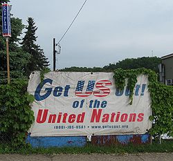 Political sign in white background advocating for the removal of United States from the United Nations