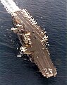 Roosevelt during her final cruise. Note AV-8A Harrier jets parked on flight deck, amidships in 1976–1977.