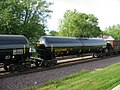 A modern tank car in a passing Union Pacific train at Rochelle Railroad Park