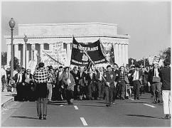 Abraham Lincoln Battalion veterans marching from the Lincoln Memorial.