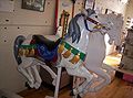 A display of a hand-carved wooden carrousel horse at the Carrousel Magic.