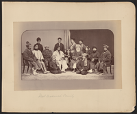 Dōst Moḥammad Khan seated slightly to the right of center in this photograph. To Dōst Moḥammad's right, the first figure in a white chapan (overcoat) is his son and successor Sher ʻAlī Khān (1825–1879), who ruled Afghanistan from 1863 to 1879. Abd al-Raḥmān Khān (c. 1844 – 1901), the grandson of Dōst Mohammad and future "Iron Amir" of Afghanistan, is on Dōst Moḥammad's far left. Photograph by John Burke.