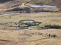 A farmstead standing between the river and a stream