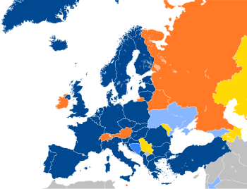 A map of Europe with countries in blue, cyan, orange, and yellow based on their NATO affiliation.