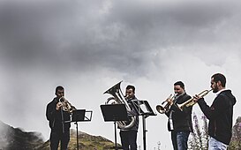 L'evento Montafoner Resonanzen, un concerto di ottoni all'aperto in montagna.