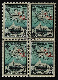 Four identical 40c stamps depicting a map of Antarctica with red flags indicating the bases. Below this are two penguins, a ship and an iceberg.
