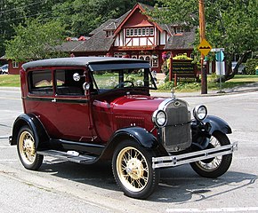 1928 Ford Model A Tudor sedan – shown for comparison, body is wider and has curved doors.