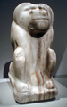 Alabaster statue of a baboon divinity with the name of the pharaoh Narmer inscribed on its base, on display at the Ägyptisches Museum Berlin.