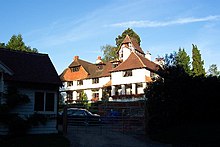 Very large white gabled house