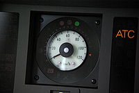 Speedometer dial, with colored lights around it