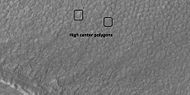 High center polygons, as seen by HiRISE under HiWish program Boxes surround two individual polygons.