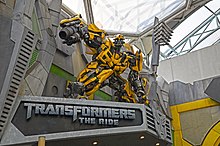 Bumblebee Statue above the entrance to Transformers: The Ride 3D.