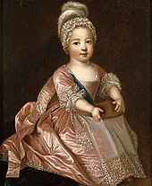 Louis XV as a boy wearing a pink dress.