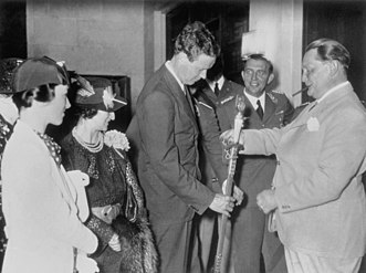 Göring presenting Charles Lindbergh, standing next to his mother and wife, with a medal on behalf of Adolf Hitler in October 1938