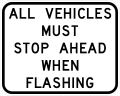 R13-2T All vehicles must stop ahead when flashing