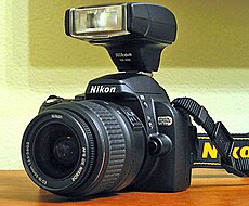 Nikon D40X with AF-S 18-55mm f/3.5-5.6G kit lens and SB-400 flash unit
