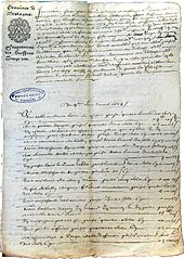 Photographie de la première page d'un acte notarié manuscrit.