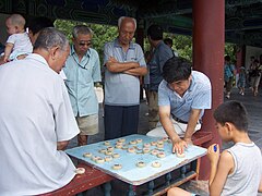 Joueurs de Xiangqi dans les jardins du Temple du ciel à Pékin.