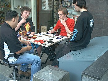 Kids playing Yu-Gi-Oh!