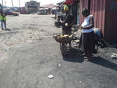 Coconuts in wheelbarrow