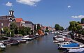 Dordrecht, view to the Wijnhaven from the bridge (Nieuwbrug) with the church (Bonifatiuskerk) tower at the left side