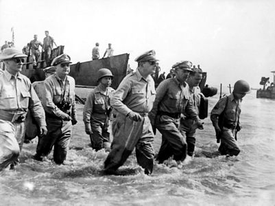 Douglas MacArthur wades ashore during initial landings of the Battle of Leyte, by Gaetano Faillace (edited by Durova)