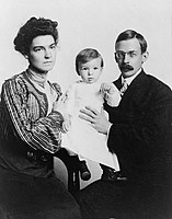 American boy, 1902. One-year-old Melville Bell Grosvenor is held by his parents, Elsie May Bell and Gilbert H. Grosvenor