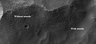 Surface showing appearance with and without mantle covering, as seen by HiRISE, under the HiWish program. Location is Terra Sirenum in Phaethontis quadrangle. Mantle fell from the sky and may be a major source of ice for glaciers.