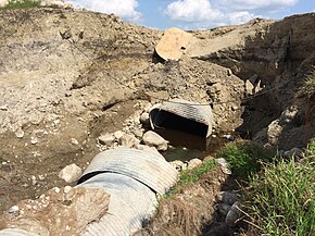 Manitoba Provincial Road 542 washed out by flooding in July, 2013.jpg