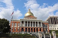 The front of the Massachusetts State House in bright daylight