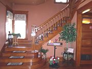 The staircase leading to the second floor of the Smurthwaite House.