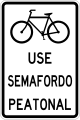 R-11-17 Bicycles use pedestrian crossing signal