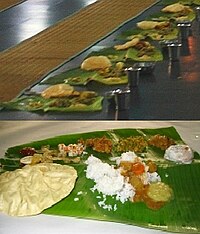 Traditional Tamil lunch served in banana leaf