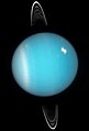 Uranus en 2005. Les anneaux, le col sud et un nuage brillant dans l'hémisphère nord sont visibles.