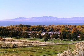 A photo of the Promontory Mountains viewed from across Willard Bay