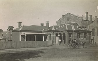 A view of the Dandenong Post Office at the start of the 20th century (now demolished). The back of the town hall on the right