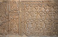 Carved stucco panels from Samarra (9th century) in Style C or "beveled" style, showing flatter and more abstract motifs (at the Museum of Islamic Art, Berlin)
