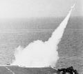 USS Guadalcanal launches a RIM-7 Sea Sparrow Missile in 1983.