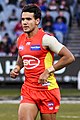 Callum Ah Chee playing for the Gold Coast Football Club in 2018