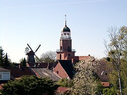 The church and windmill of Ditzum in Jemgum municipality