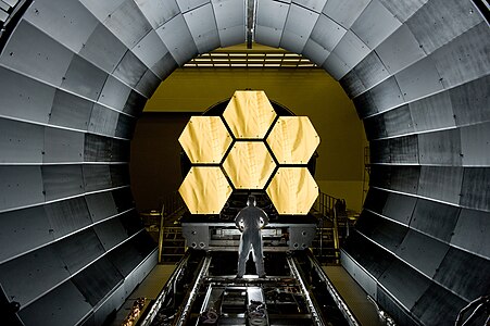 Mirrors of the James Webb Space Telescope prepared for acceptance testing, by NASA/MSFC/David Higginbotham