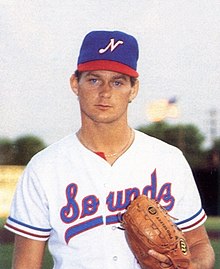 A baseball player in red, white and blue