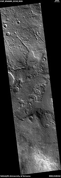 Channels that empty into a low area that could have been a lake, as seen by HiRISE under HiWish program