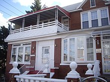 Photographie de la façade de la maison familiale de Jackie Robinson à Stamford