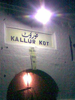 Nameplate of 100 years old Kallur Kot Station under the lamp