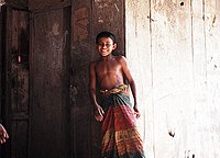 Bangladeshi boy in a traditional lungi.