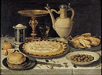Table with Orange, Olives and Pie, probably 1611, with the "signed knife", from the Prado set [1]