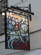 Secondary sign, with another depiction of Saint George slaying the dragon.