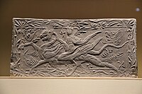 An immortal riding on a dragon, Dengzhou painted stone-relief [zh], Liu Song dynasty.
